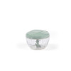 Manual food chopper with green lid and clear bowl, shown on white background