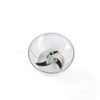 Clear plastic food processor bowl with green three-blade attachment inside, viewed from above