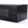 Black manual microwave oven with side control dials, shown angled on a white background