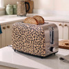 Beige leopard print two-slice toaster with croissants