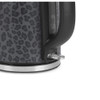Black kettle with grey leopard print design, close-up of base and handle