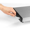 Hand pulling silver handle on stainless steel warming tray