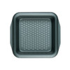 Green square non-stick cake tin with textured base, top-down view