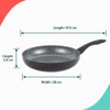 Set of three non-stick frying pans with cooked chicken, fish and vegetables.