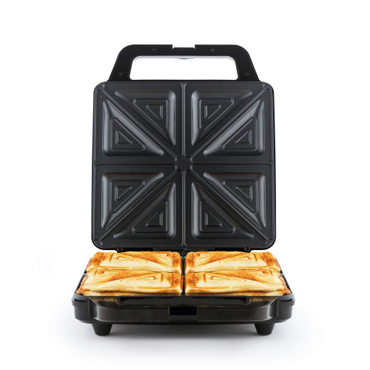 Black sandwich maker with four toasted sandwiches, open lid view