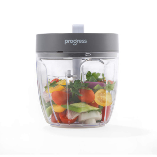 Grey Progress manual food chopper with mixed fresh vegetables inside, front view