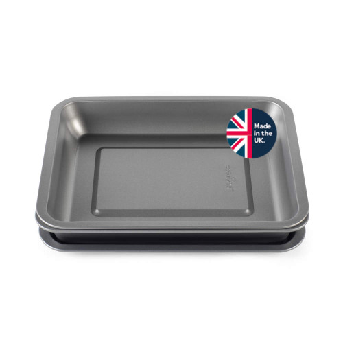 Set of two silver rectangular baking trays with 'Made in the UK' badge.