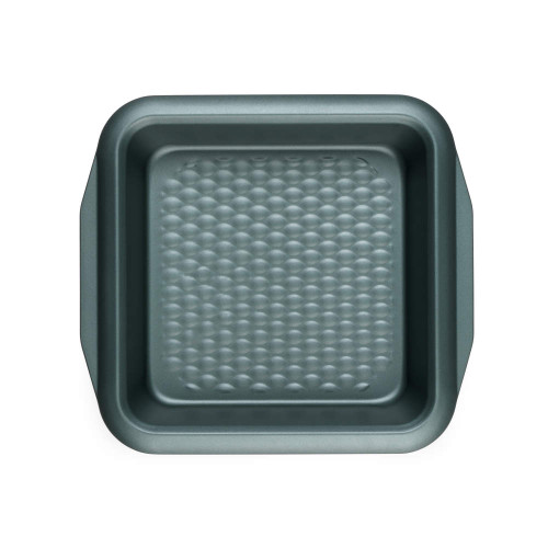 Green square non-stick cake tin with textured base, top-down view