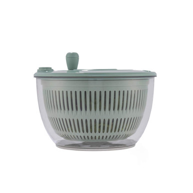 Green salad spinner with clear bowl and lid, shown from the side.