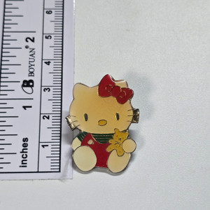 Hello Kitty Enamel Pin (YELLOWING. LATCH THING ON THE BACK HAS THE PIN POKING OUT A LITTLE. BE CAREFULLLLL) - 20260112 - RWK596