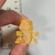 SD Radioactive Lawsuit Lizard Series - Clear Orange #01 - 20260422 - RWK633