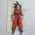 Dragon Ball Z Super Battle Collection Action Figure - Goku (BOOT?, STICKER IS UPSIDE DOWN ON BOTH SIDES SO THAT'S MY GUESS)) - 20260928