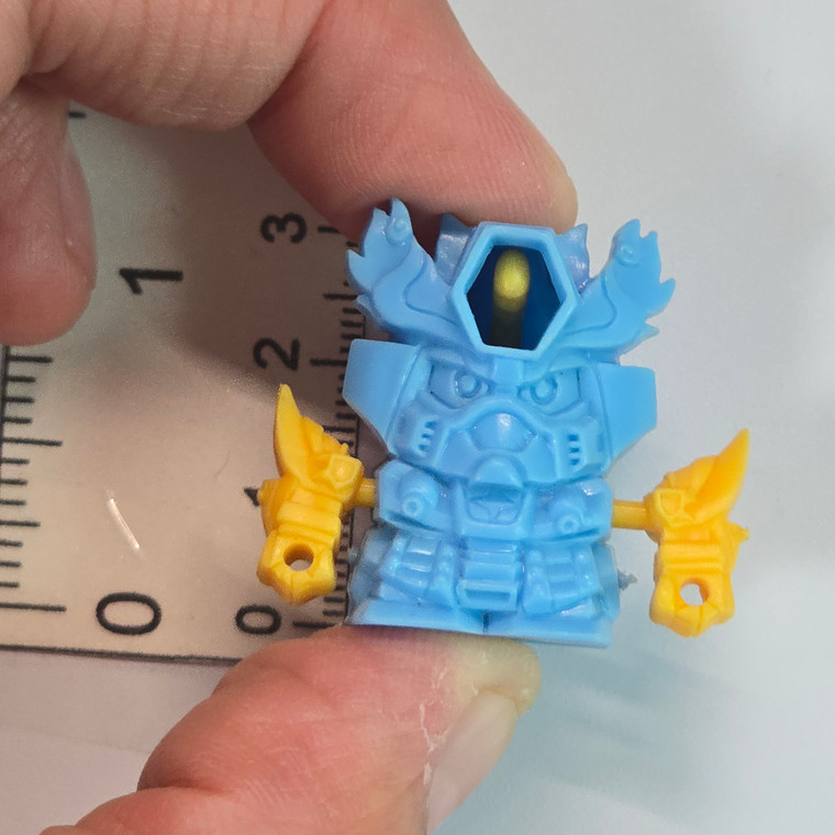Plastic Gundam Mini Figure (SOME SHIT SHOOTS OUT OF HIS HEAD WHEN YOU PULL HIS ARM) - 20260410