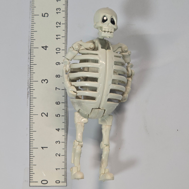 Vintage BOOTY BOOT Skeleton Tamagoras Egg Transforming Mini Figure - 20260413 - RWK631