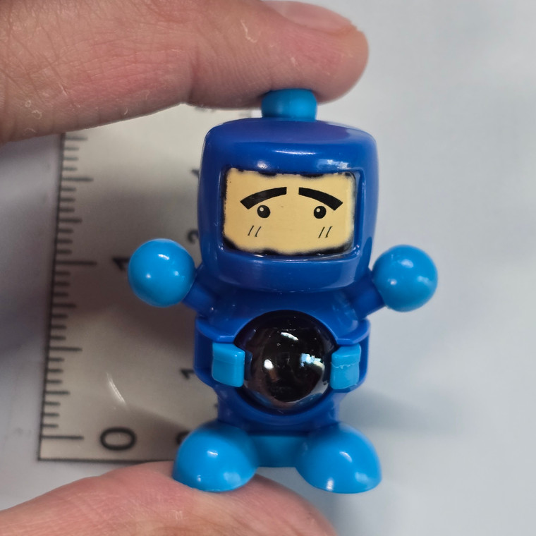 Bomberman B-Daman Mini Figure w/ Marble (HAS MARKER INK AROUND THE FACE AND ON TOP OF THE HEAD) - 20260508 - RWK644