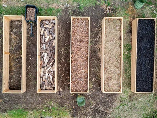 Various substrates for mushroom cultivation - wood chips, sawdust, thick wood chips