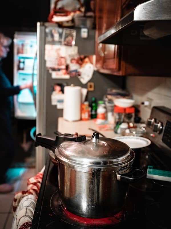 Pressure cooker sterilizing substrate on a stove - Sterilization and Pasteurization for Contamination-Free Substrates