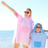 Pink Hooded Kids Poncho by Splosh