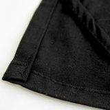 Hemmed edge and hanging towel on Plain Black Tea Towel by Good Linen Co