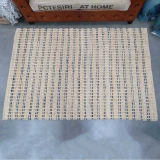 Woven Floor Rug by Backyard