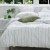 Close up of Freddie Duvet Set with Stripe Reverse by MM Linen