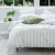Close up of Freddie Duvet Set with Stripe Reverse by MM Linen