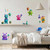 Little Lurkers monster wall stickers in a modern kids bedroom showing removable characters and party accessories.