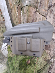 magazine pouch with OWB holster in background