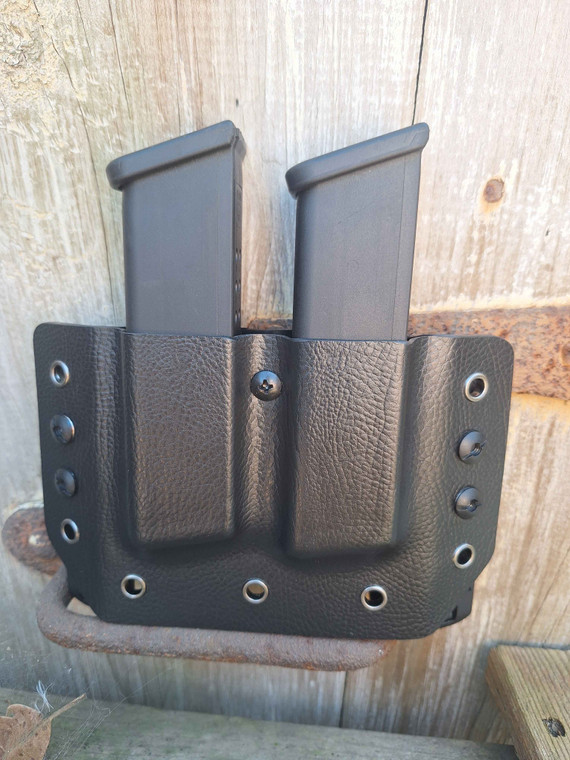 Black raptor with Molle lok style mounts