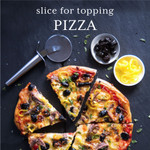 Sliced pizza topped with olives, peppers and cheese