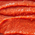 close up shot of pizzeria style pizza sauce out of jar