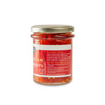 Side image of chopped calabrian peppers in a jar Side image of chopped calabrian peppers in a jar