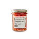 Side image of chopped calabrian peppers in a jar Side image of chopped calabrian peppers in a jar