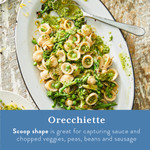 Orecchiette pasta with pesto and peas served on a plate