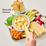 DeLallo Focaccia Thins served with hummus and veggies.