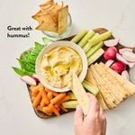 DeLallo Focaccia Thins served with hummus and veggies.