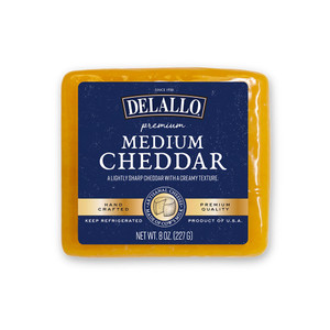 Front view of our Delallo Medium Cheddar Cheese.