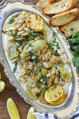 Roasted Artichokes and Beans over Whipped Pesto Ricotta