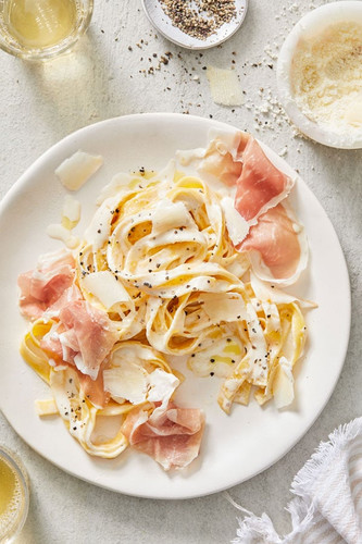 Egg Fettuccine with Parmigiano & Prosciutto Cream Sauce Egg Fettuccine with Parmigiano & Prosciutto Cream Sauce