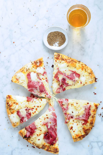Reuben Pizza With Corned Beef & Dijon Béchamel Sauce Reuben Pizza With Corned Beef & Dijon Béchamel Sauce