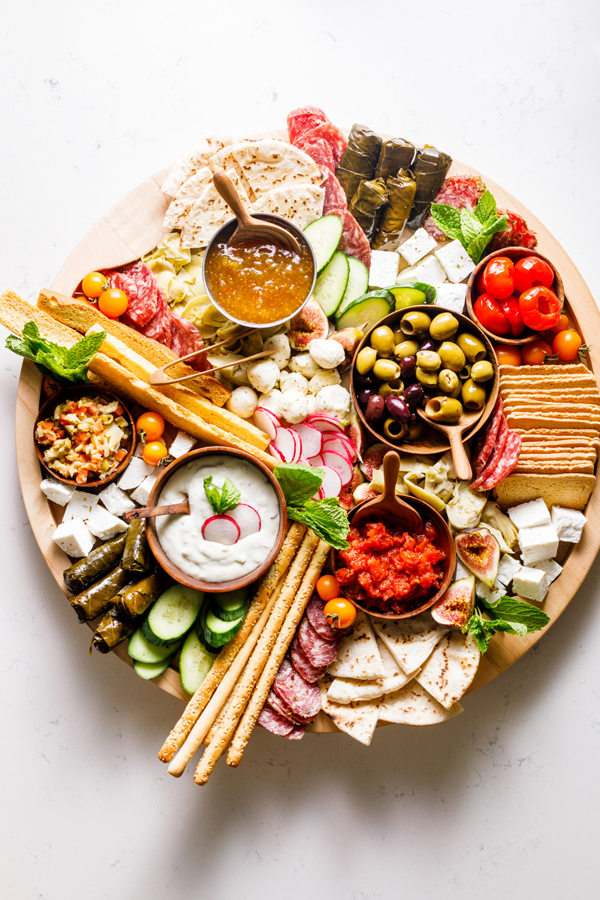 Mediterranean Charcuterie Board with olives, feta cheese, meats and more