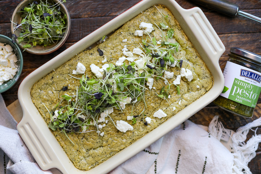 Pesto Baked Eggs in a baking dish and ready to be served.