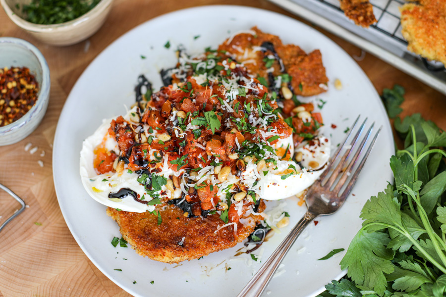 Burrata Bruschetta Chicken Cutlet served on a plate and ready to eat.
