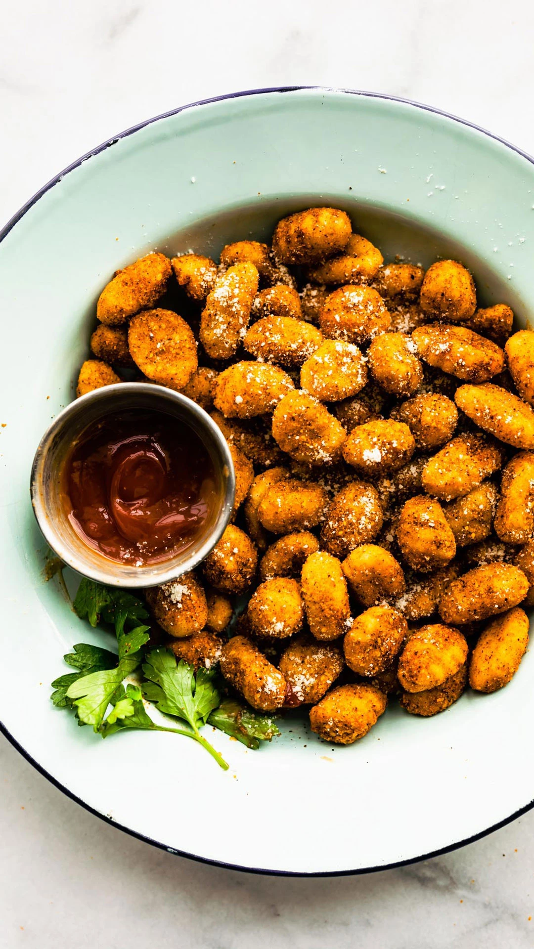 Air Fryer Gnocchi ready to be served to a crowd.