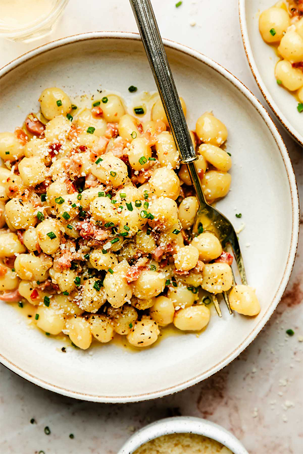 Potato gnocchi in a carbonara sauce with bacon