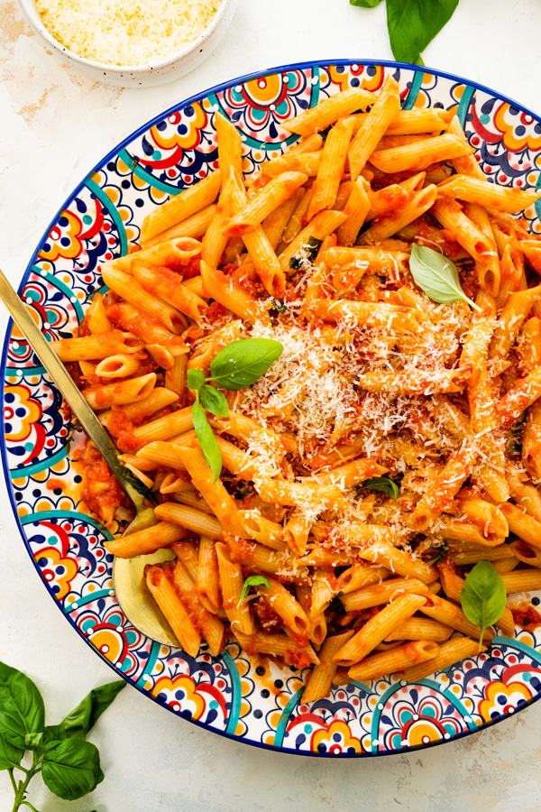 Pasta with red sauce in a bowl.