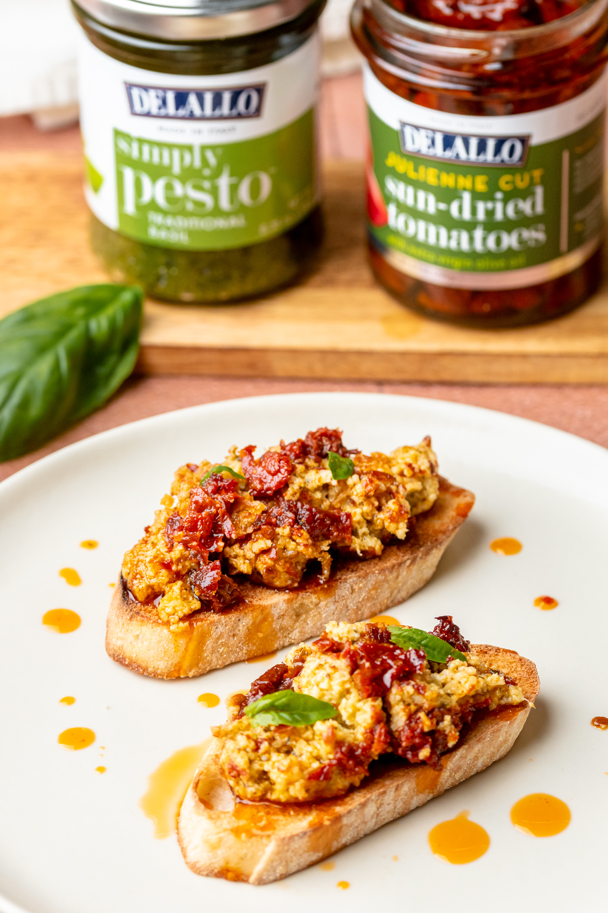 Sun-Dried Tomato Pesto Dip served on toasts