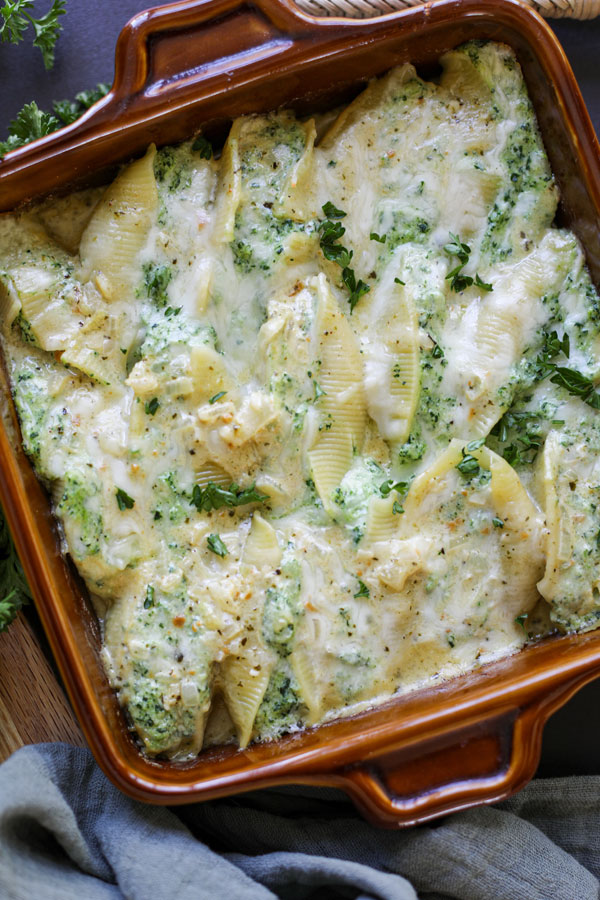 Jumbo shells pasta stuffed with a creamy ricotta pesto sauce