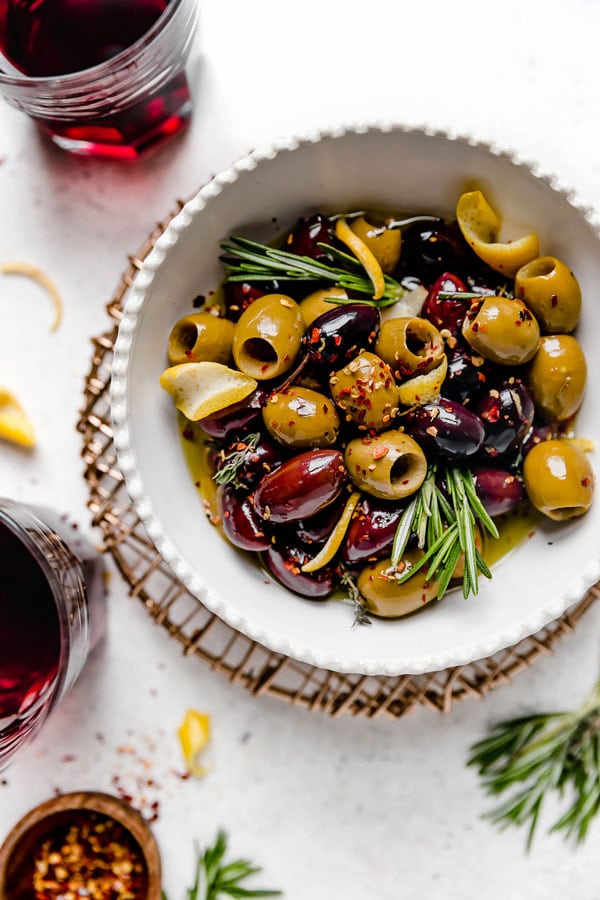 Marinated olives in white bowl 