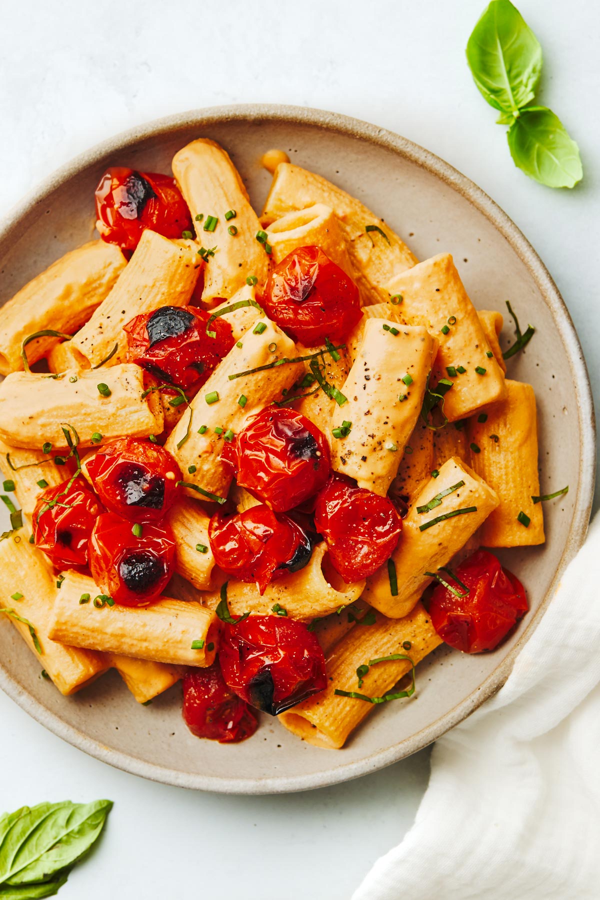 Red Pepper Pasta with Blistered Tomatoes on a plate